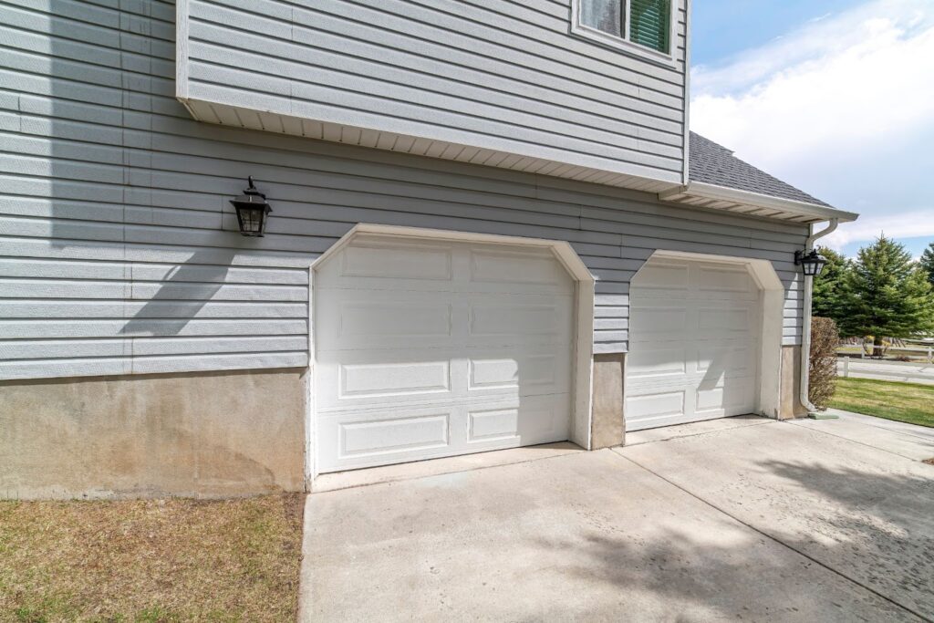 Garage door repair service in Atlanta, GA. Also offering siding installation, cleaning, and various siding options for homes
